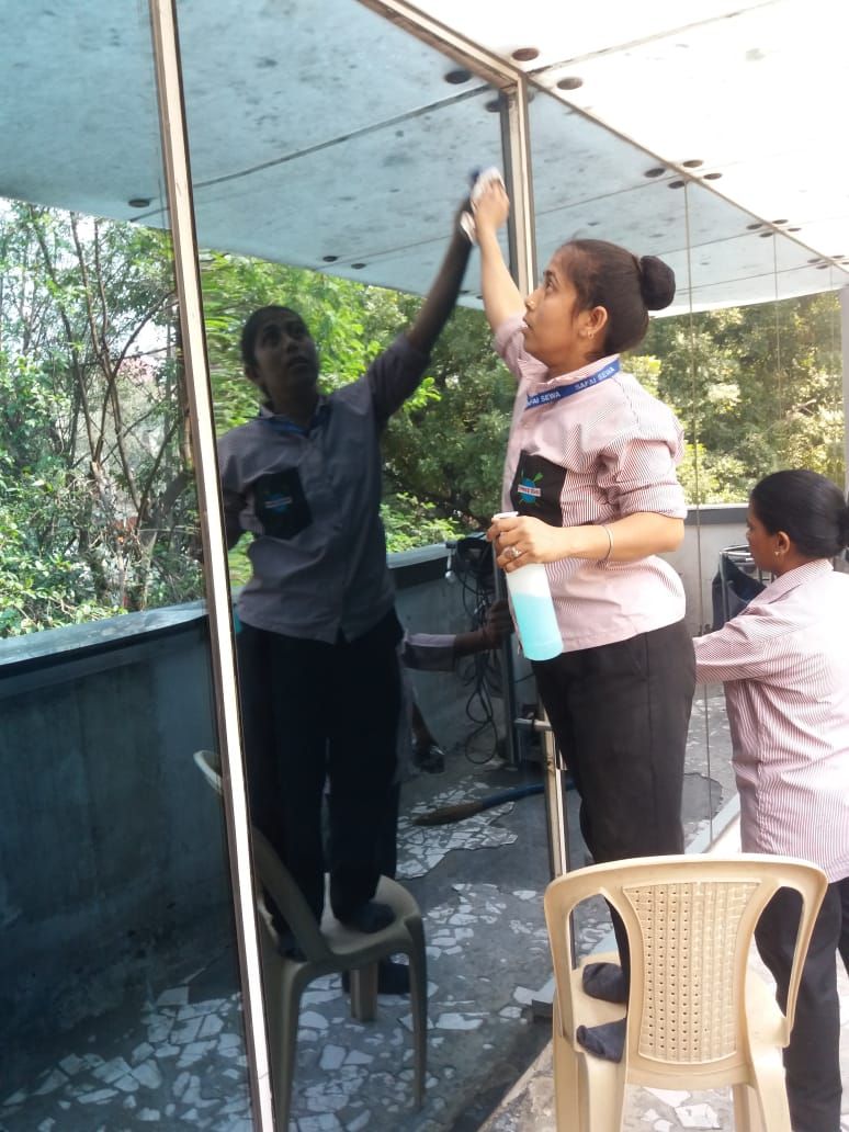 Glass cleaning by safai sewa housekeeping cleaning expert