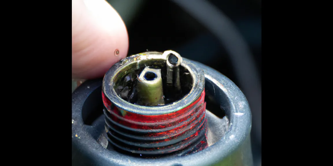 Is Your Lawn Mower's Spark Plug Covered with Oil?
