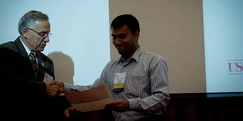 Prasanta receiving honourable mention at MHI Research Festival for paper titled "Processing speech signal using auditory-like filterbank provides least uncertainty about articulatory gestures"