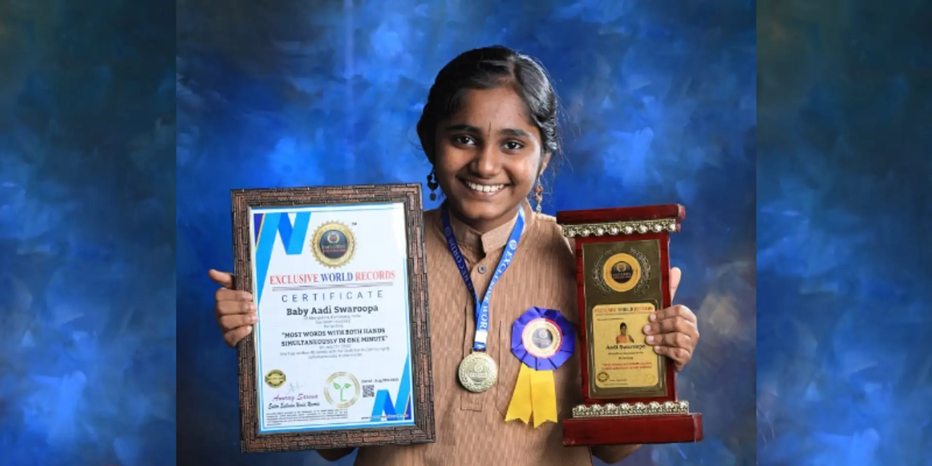 ಎರಡು ಕೈಯಲ್ಲಿ ಬರೆದು ದಾಖಲೆ ಬರೆದ ಮಂಗಳೂರಿನ ಬಾಲಕಿ