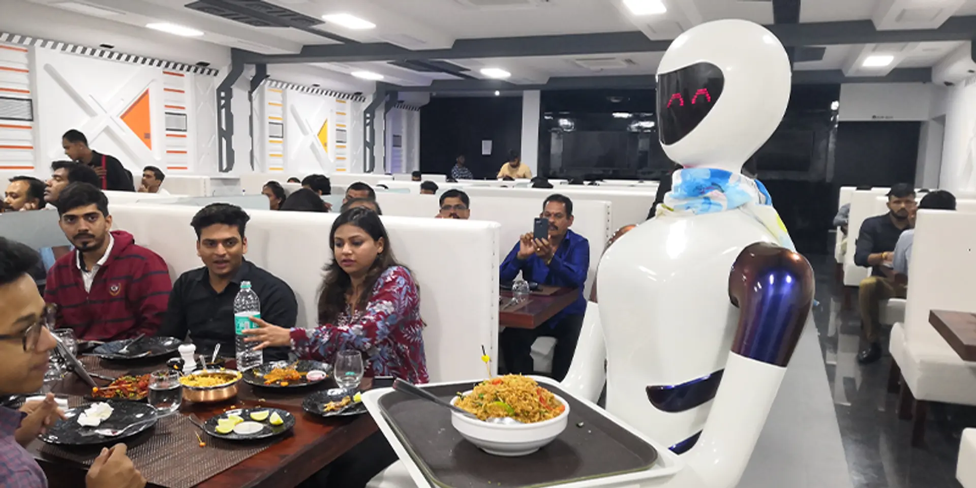 Meet these robot waiters giving a futuristic spin to dining