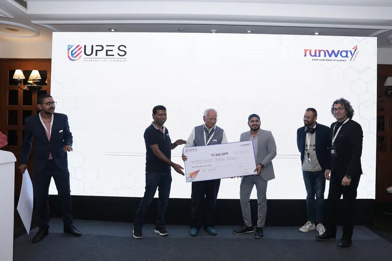 Entrepreneurs getting their winning prize