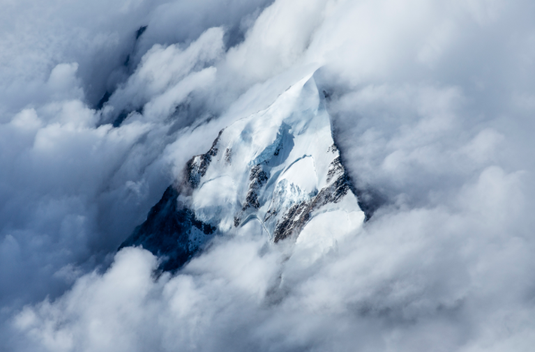 Looking down on Mt Cook during a moving storm by Mark Clinton, Australia