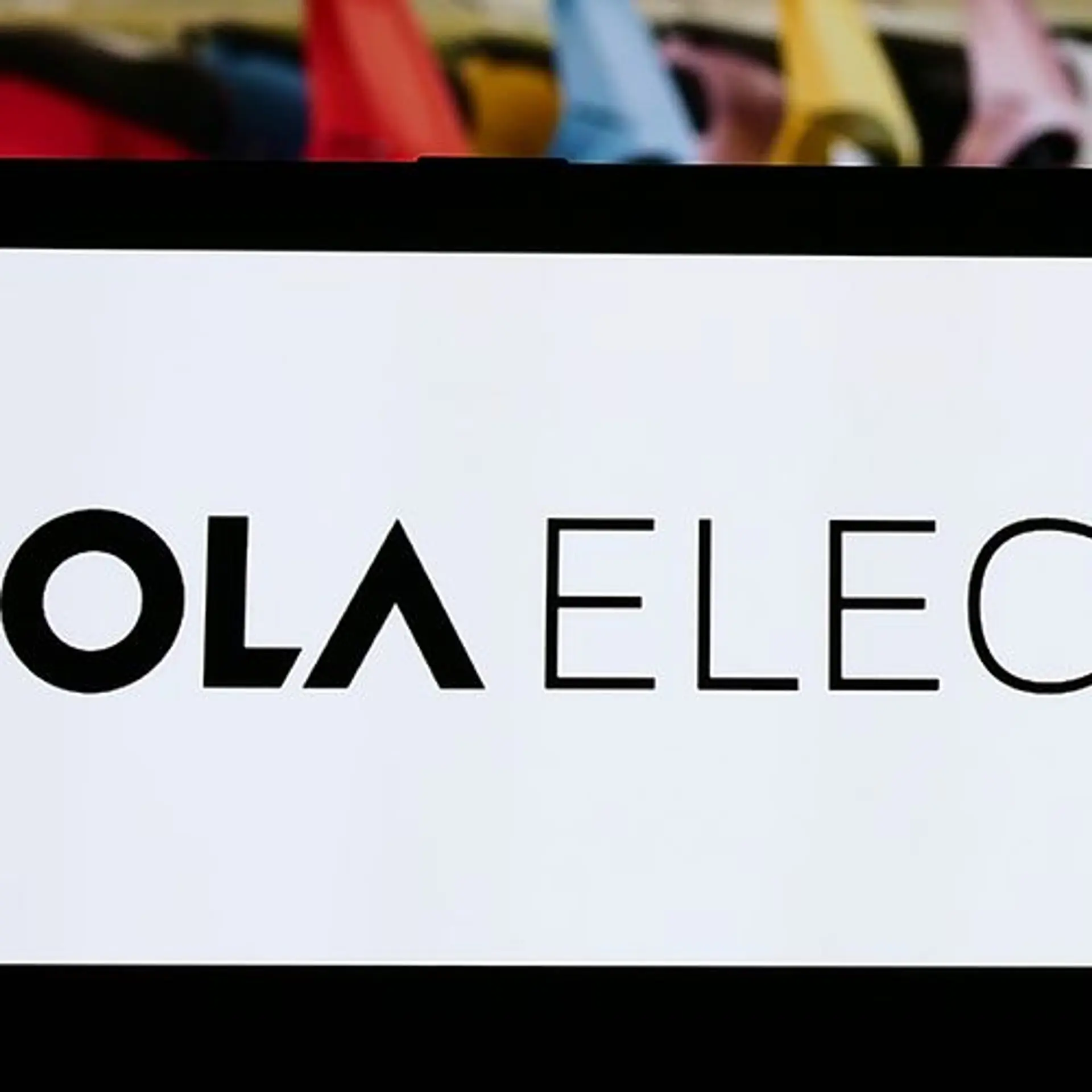 Ola Electric's losses halve, but revenue rout deepens