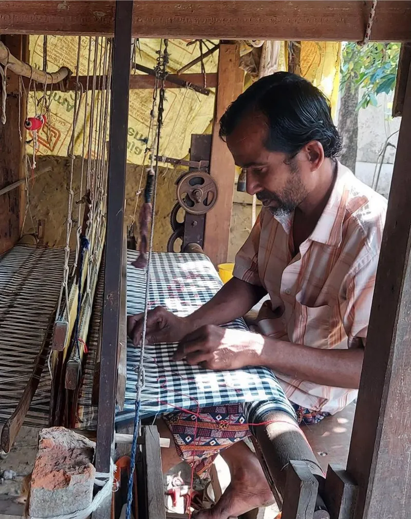 Weaver at work at The Loom Art