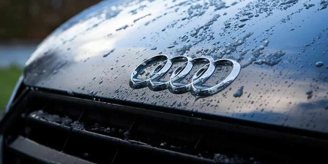 The Interesting Story Behind The Four Circled Symbol Of Audi Logo -  Creative Polo