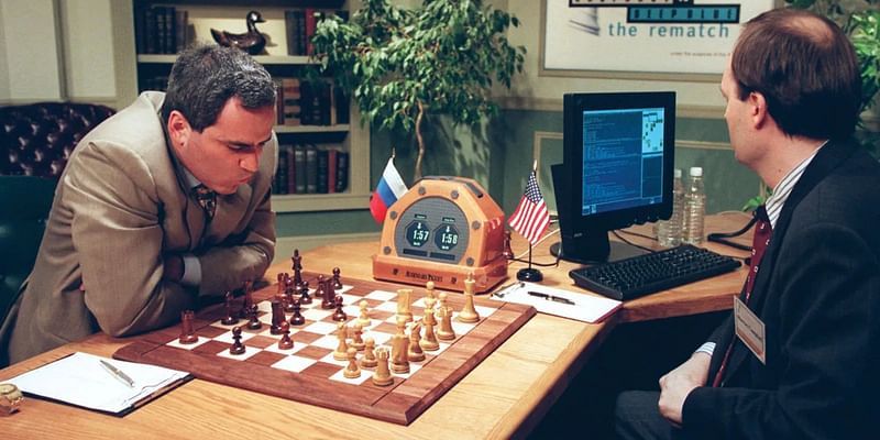 World chess champion Garry Kasparov walks around the playing room as he  waits for IBM's Deep Blue chess playing computer to make its next move  during the third game of their six