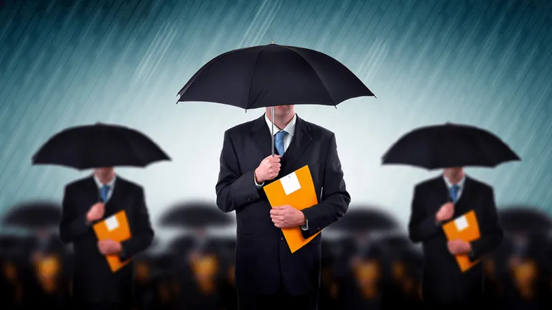 three men holding black umbrellas