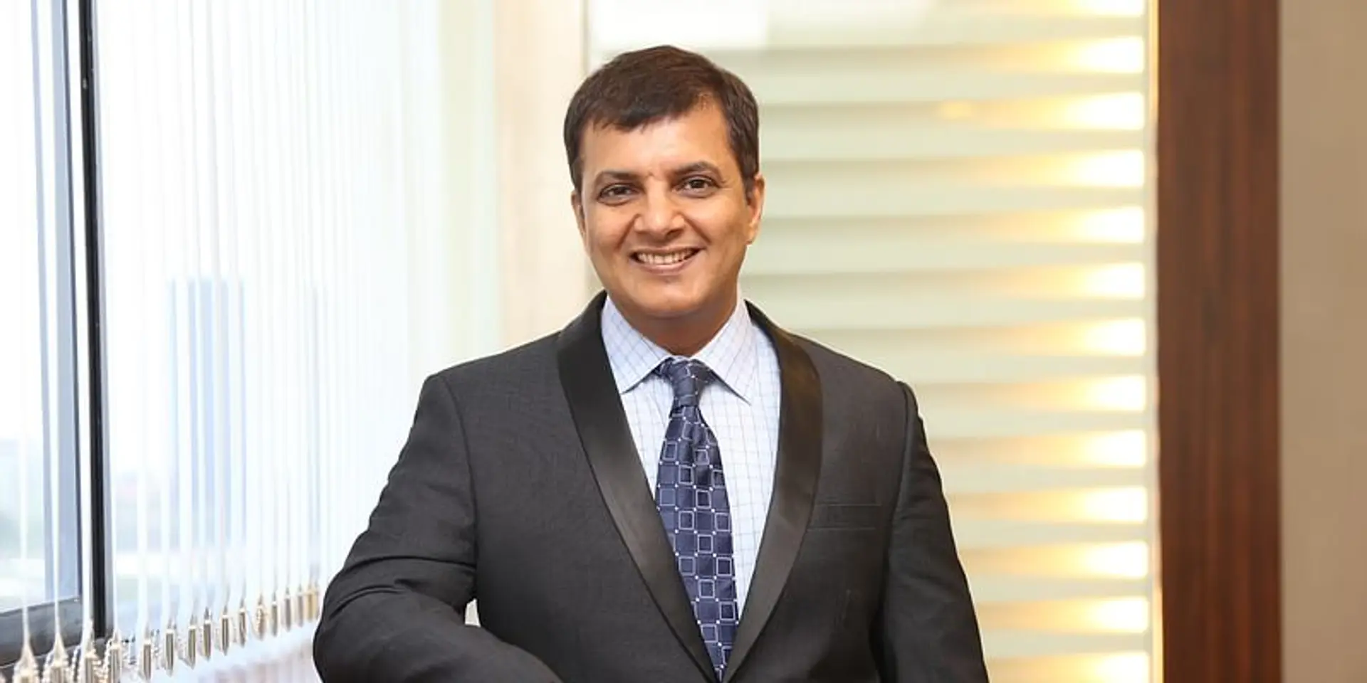 Starting with just 4 employees in a 3 BHK, this design engineer built a Rs 1,106 Cr IT services company