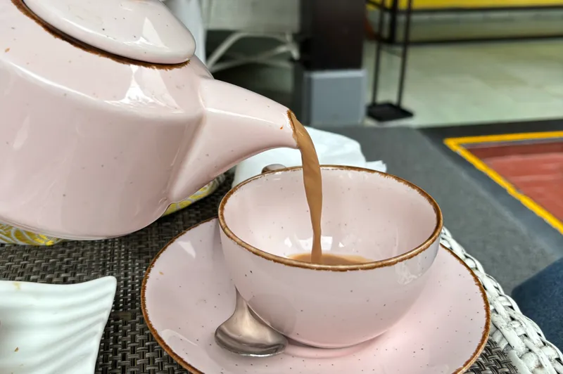 Tea being poured at High Tea, one of the stay’s quiet pleasures