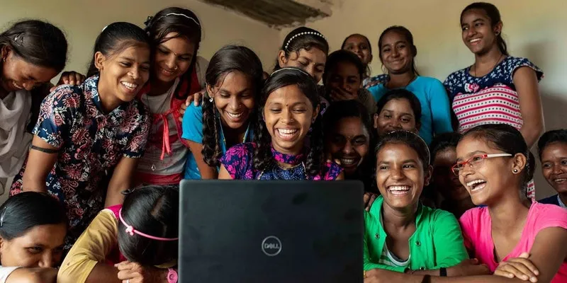 Girls taking part in digital literacy class. 
