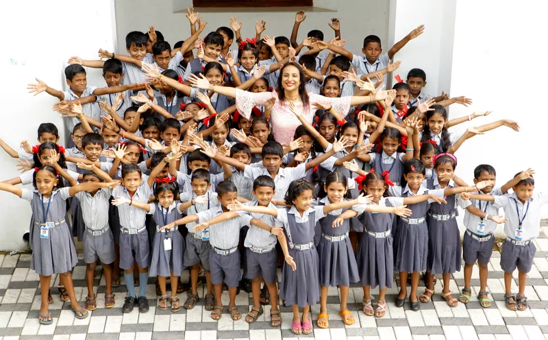 Roopa George with children