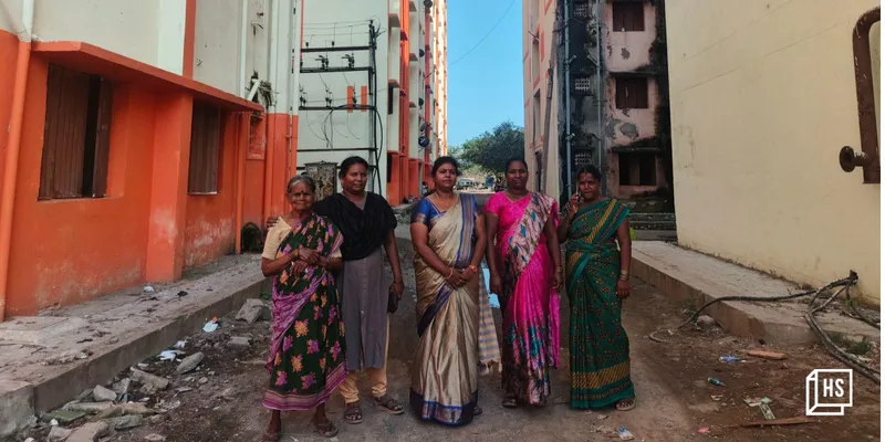Facing crime and health hazards, women find themselves trapped in urban resettlement slums. In photo: women at the Perumbakkam resettlement site.