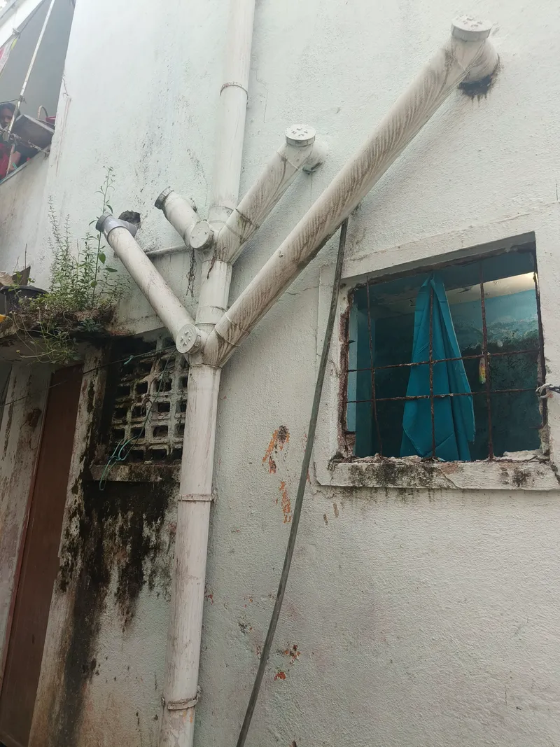 Some bathrooms at the Perumbakkam resettlement site have no windows, leaving women and children at risk all day.