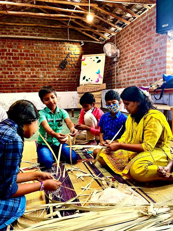 Mohana Vani teaches palm leaf art and craft making to school children as part of holistic learning methodologies.