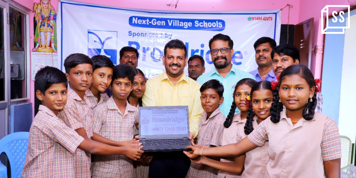 A techie who studied under street lamps is ensuring other children have access to tech education