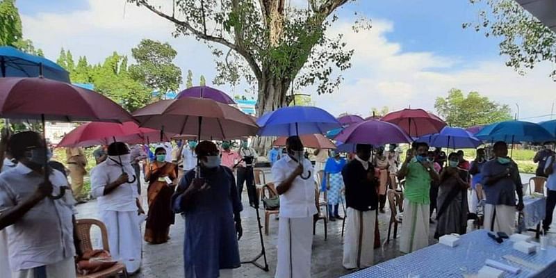 Coronavirus: This village in Kerala is using umbrellas to practise social distancing
