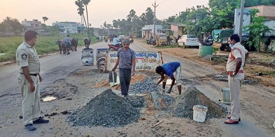 These cops from Andhra Pradesh took it upon themselves to repair roads to prevent accidents