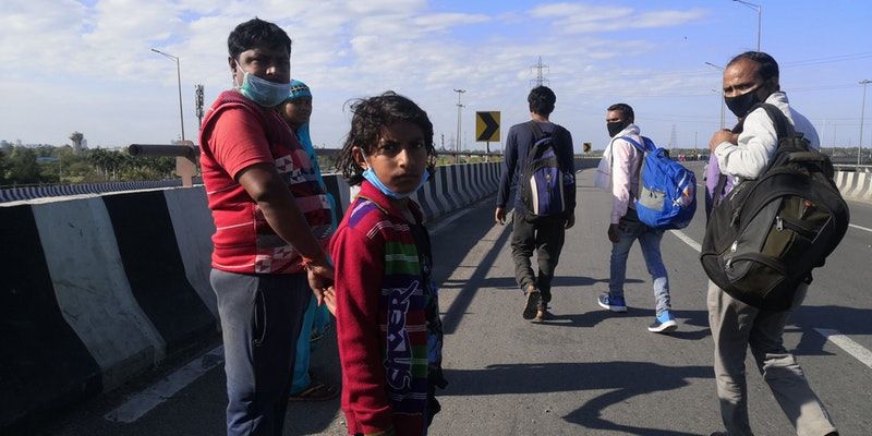 Coronavirus: Long walk home for migrant workers returning to villages on foot amid lockdown