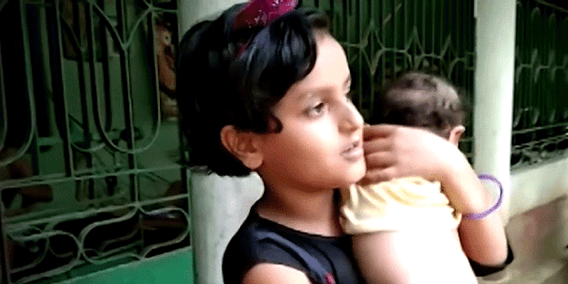 This 7-year-old girl takes up responsibility for her little brother as parents succumb to COVID-19 