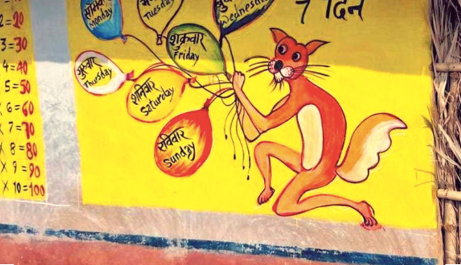 Jharkhand teacher paints village walls with the alphabet to help students learn during the lockdown
