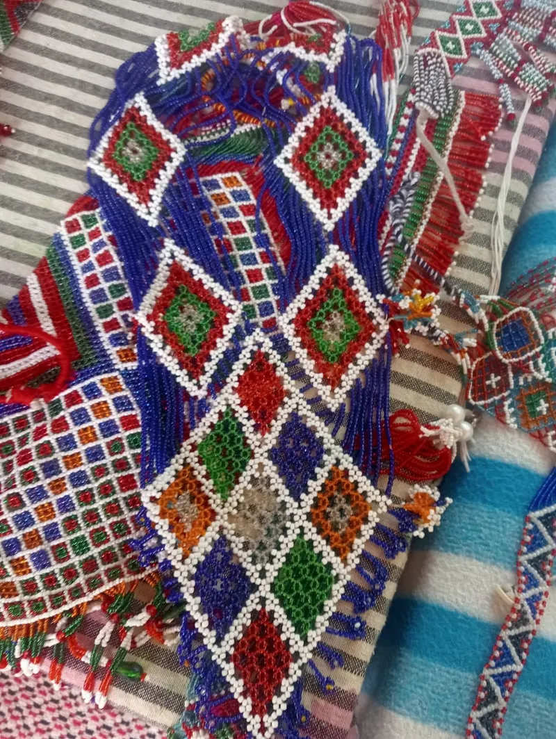 The women at the centre learn beaded jewellery making, knitting, and embroidery on scarves and caps.