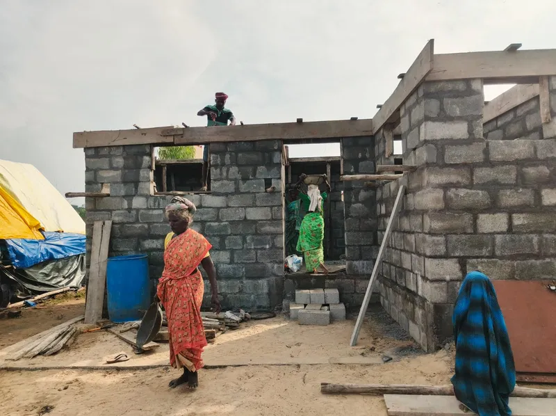 In the village of Pattipulam, AID India has identified four poorest families desperate for shelter, and started constructing homes for them. However, without having secured a patta for this relocated settlement, the homes are under the constant risk of eviction.
