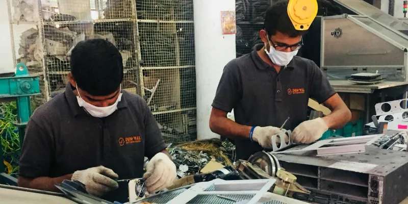 Deshwal employees working with e-waste