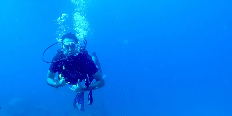 Amtosh Singh enjoys watersports like scuba diving
