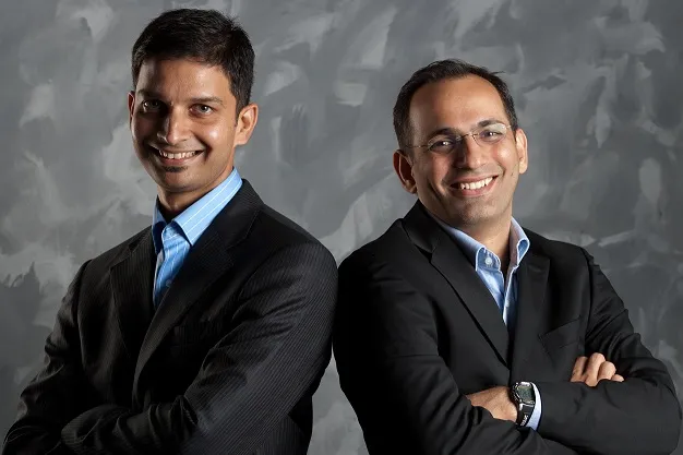 L to R Peeyush Rai, Dr. Dhiraj Kacker