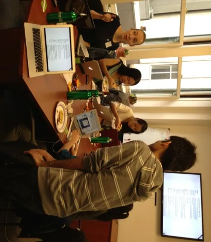 PyLadies being tutored by a Plivo member