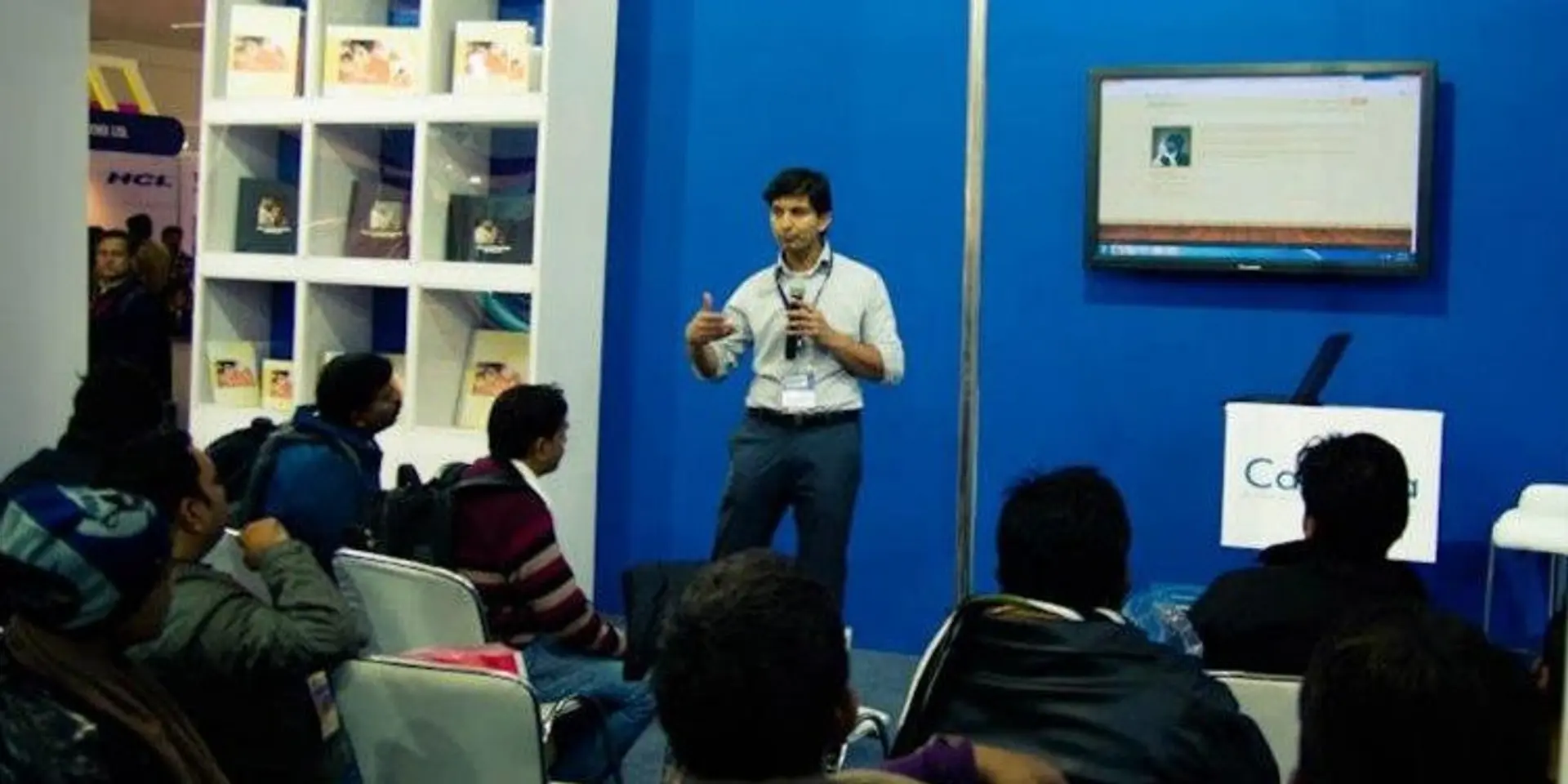 How did Canvera manage to engage 15,000+ photographers to augment their business?