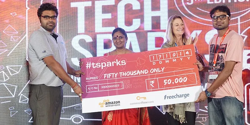 Sagar Pandey (right) receiving the prize after TechSparks Hackathon