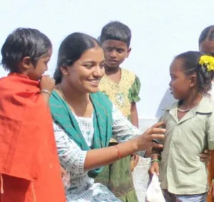 Meenakshy with the kids at the village school