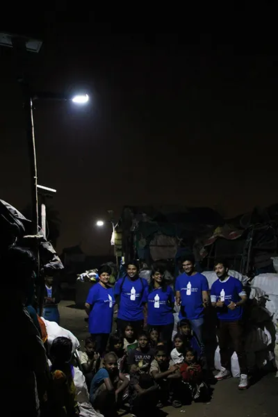 Volunteers during a nightlight installation
