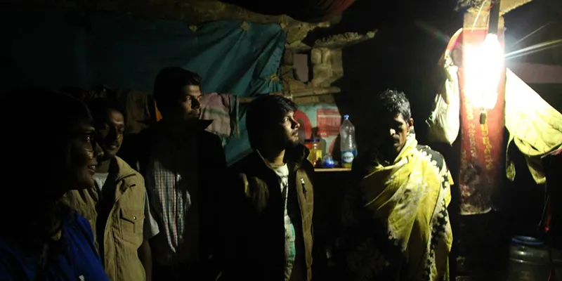 Tripti Aggarwal (left) during a nightlight installation