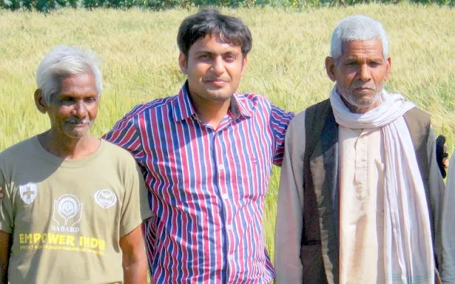 Abhishek Pandey (centre) with farmers