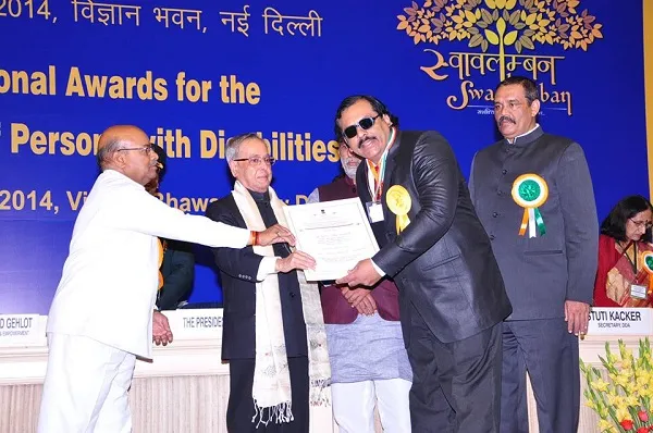 Receiving the prestigious National Award for the Empowerment for Persons with Disabilities under the best self-employed resident category