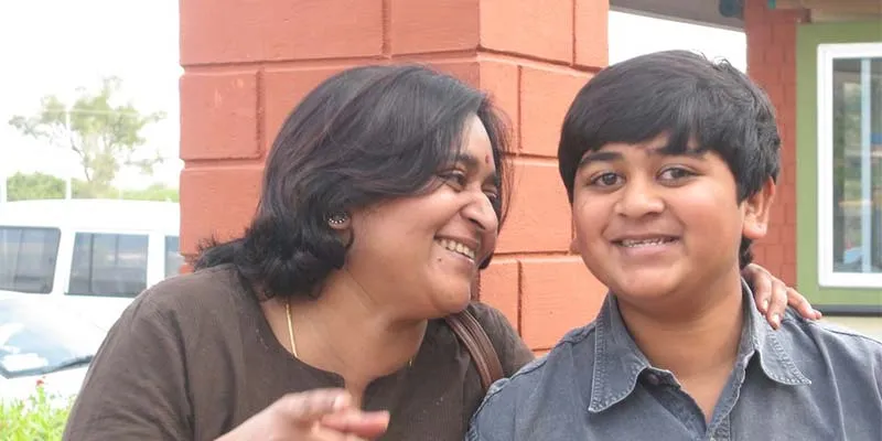 Childhood photo of karthik with his mother