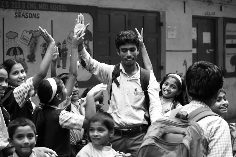 Jai Mishra(centre) surrounded by his students