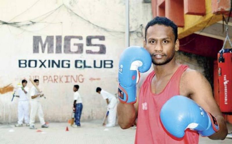 Lack of funds pushes national boxing champion to drive goods carrier to make ends meet