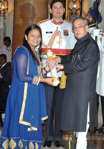 Receiving the Padma Shri from president Pranab Mukherjee