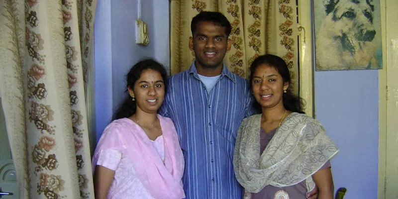 Santosh with his sisters.