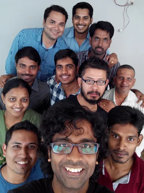 Raghu(front, center) with the ConceptWaves team
