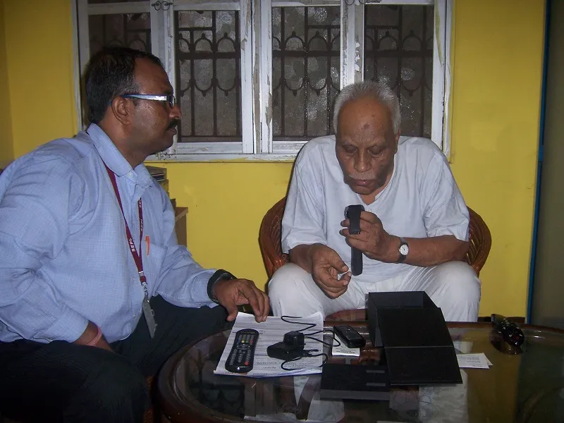 Retired Lt. Col. Bhaduri with the watch and a team member from 'Support Elders'