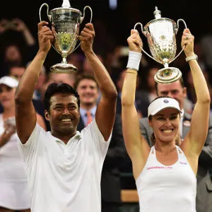 Leander Paes and Martina Hingis with Wimbledon trophy