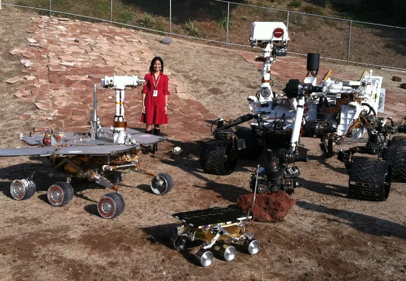 Vandi Verma with all three generations of NASA Mars rovers: (R-L) test rover for Mars Science Laboratory, flight spare for Sojourner and working sibling to Spirit and Opportunity.