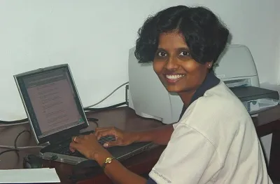 Shahani at desk - Virtusa 2003