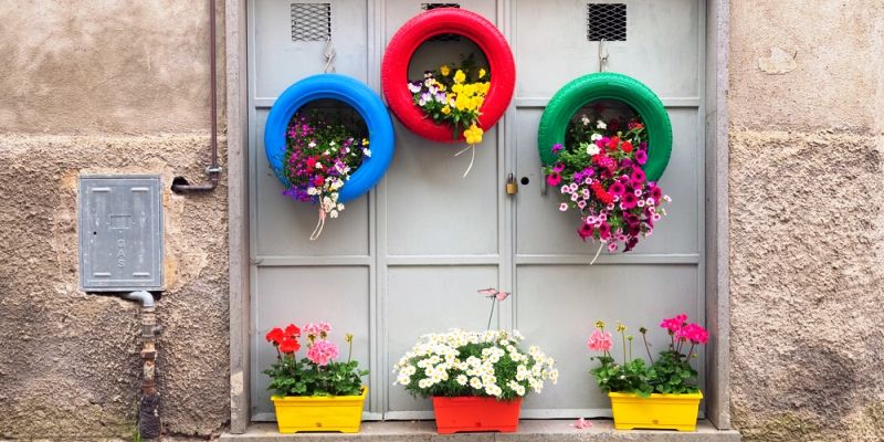 Old tyres get upcycled into colourful wall hangings, planters