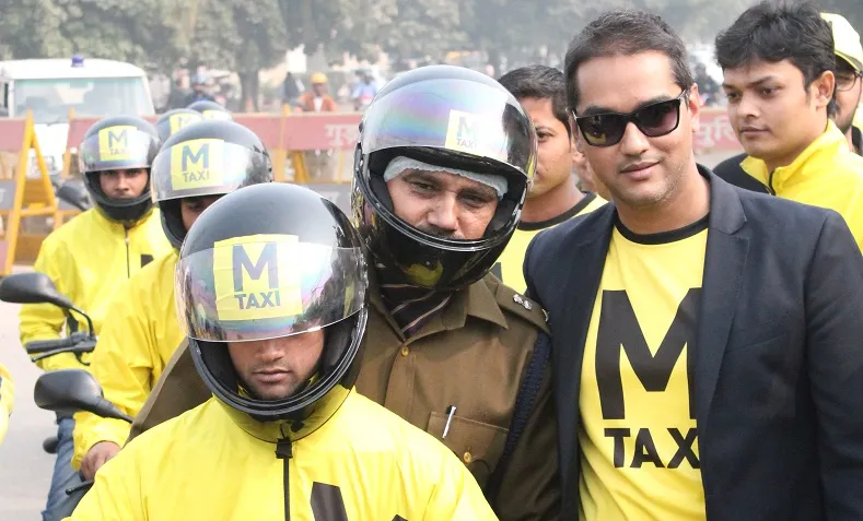 Balbir Singh, Deputy Commissioner of Police, Traffic Gurgaon takes the ride on M-TAXI